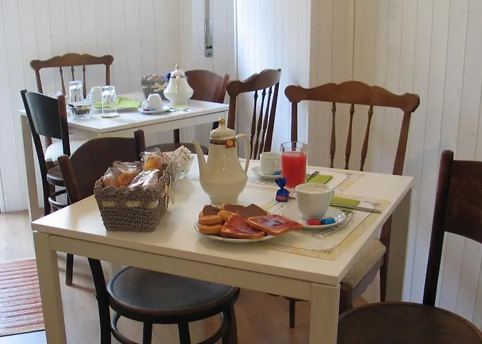 Arch Acomodação com café da manhã 